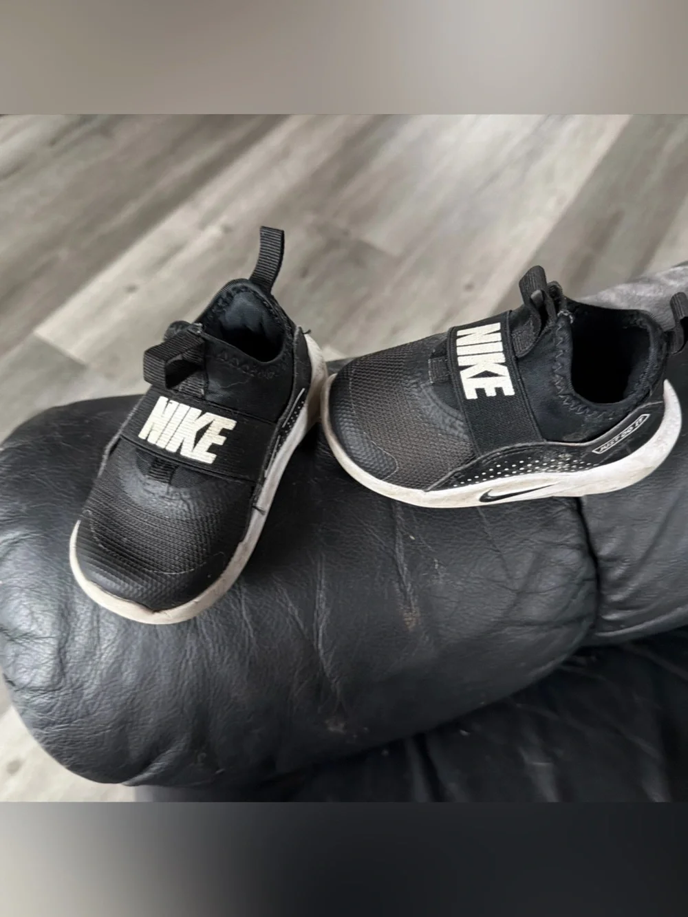 Nike Black and White Slip-On Sneakers with Strap